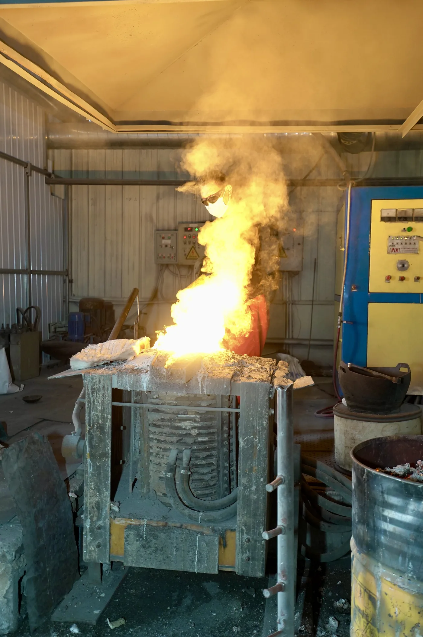 Molten stainless steel pouring during investment casting at MCHEN